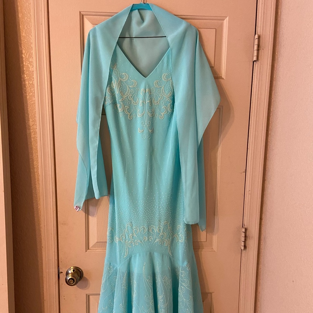 Long aqua colored formal dress